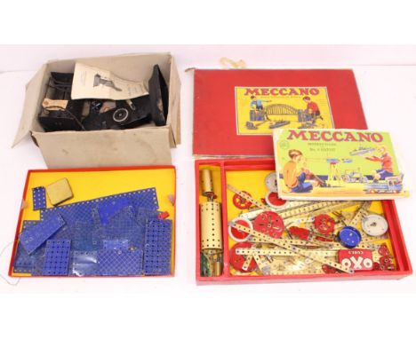 Meccano: A boxed Meccano Set No. 7 with various parts, damaged lid. Together with a boxed No. 2 "Ray" Projector, Construments