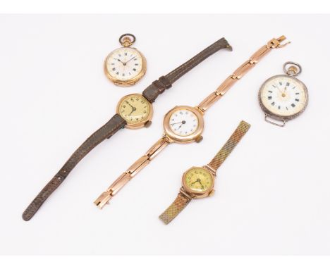 ***AUCTIONEER TO ANNOUNCE ONE OF THE FACETED  WATCHES IS PLATED NOT GOLD*****  A collection of ladies vintage wristwatches to