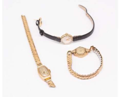 A collection of three ladies vintage 9ct gold dress watches, to include a round cased Summit on leather strap, Bentima with r