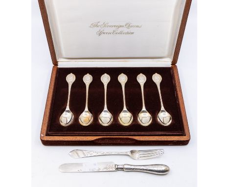 A cased set of six novelty Queen Elizabeth II silver teaspoons titled "The Sovereign Queens Spoon Collection" depicting Mary 