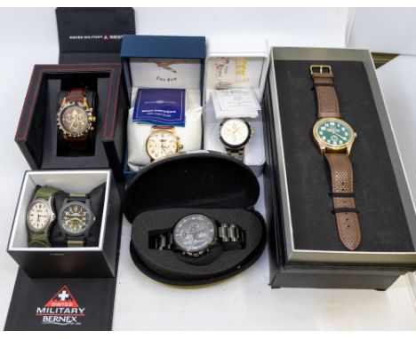 A collection of gents wristwatches to include two Timex Expedition watches both on canvas straps, one cased, along with&nbsp;