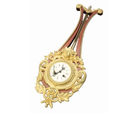 Edwardian harp 8-day wall clock, Roman numerals with gilt face surrounds and detail in a mahogany frame,  Condition: Gilt dec