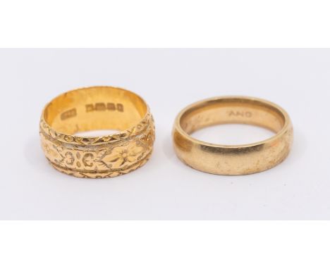 Two gold bands, including an 18ct gold wide band with foliate decoration, width approx 9mm, sizes R1/2, weight approx 7.2gms,