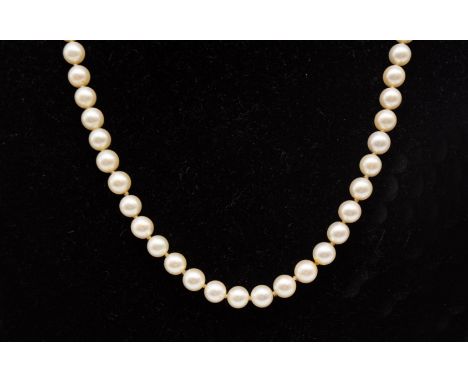 A vintage cultured pearl uniform necklace, each approx 6mm, strung to a white metal and diamond set box clasp, length approx 