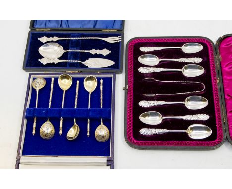 A collection of cased silver spoons to include; a set of six cased Russian silver gilt condiment spoons, having niello foliag