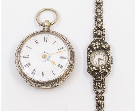 A ladies vintage silver cased marcasite set dress watch, with round silvered dial, Arabic numerals, with decorative bow shape