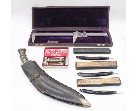 A mixed lot to include: a 1960's Indian ceremonial kukri knife with scabbard.  A Brown and Sharpe calibrator, a 'Valet' safet