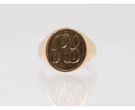 A gents 9ct gold heavy weight signet ring, comprising an oval initlialled top, width approxx 16mm, size R, weight approx 10gm