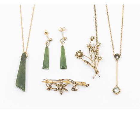 A collection of jewellery to include an early 20th century aquamarine set drop necklace in unmarked yellow metal assessed as 