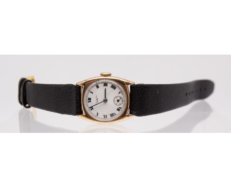 An early 20th century 9ct gold W.C Watts of Derby wristwatch, comprising a signed white enamel dial, numeral indices and subs