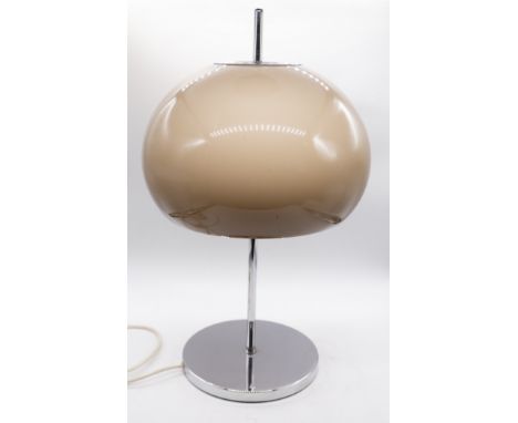 A mid 20th century table lamp in the manner of Harvey Guzzini for Meblo, with an acrylic shade on a chrome base. Untested. Ap