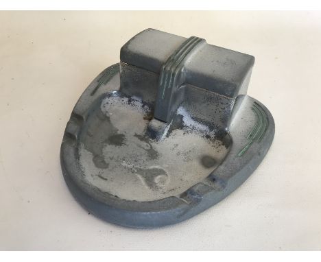 A Lucas aluminium ink stand, produced as a promotional item.