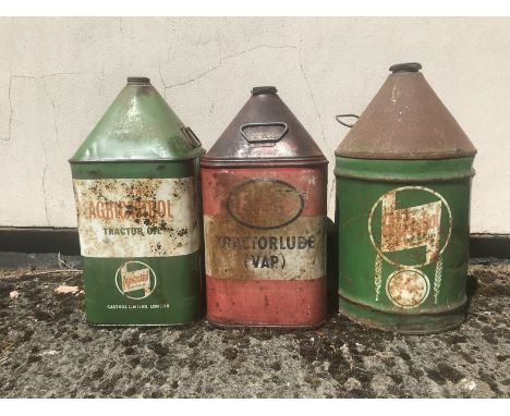 Two Agricastrol five gallon pyramid cans and an Esso Tractorlube (VAP) five gallon pyramid can.