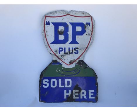 A BP Plus Sold Here globe-shaped double sided enamel sign by Franco, 20 x 31 1/2".