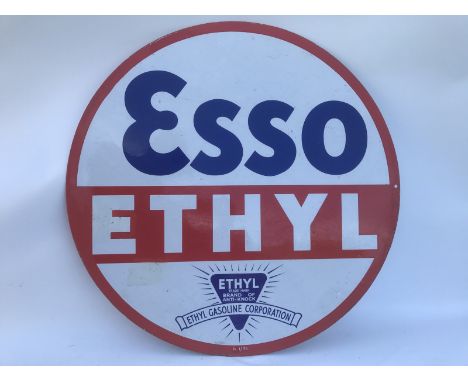 An Esso Ethyl circular double sided enamel sign dated January 1935 with two spots repaired and retouching to the red border, 