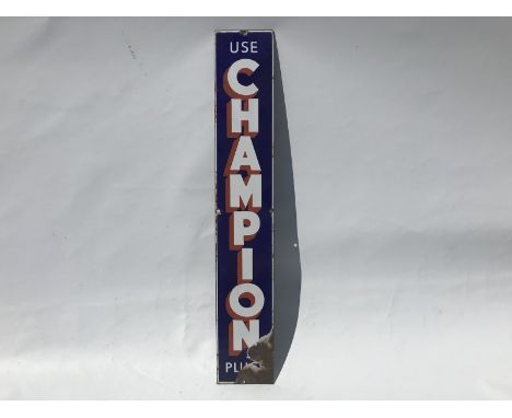 A Champion Plugs narrow enamel sign with good gloss, 4 x 24 1/2".