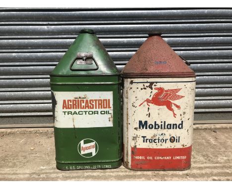 A Mobiland Tractor Oil five gallon pyramid can and another for Agri-Castrol.