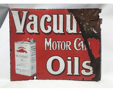 An early Vacuum Motor Car Oils double sided enamel sign with hanging flange, with image of can to one corner, by Wildman and 