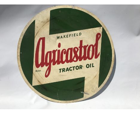 A Wakefield Agri-Castrol Tractor Oil circular aluminium advertising sign by Cowling, 23 3/4" diameter. 