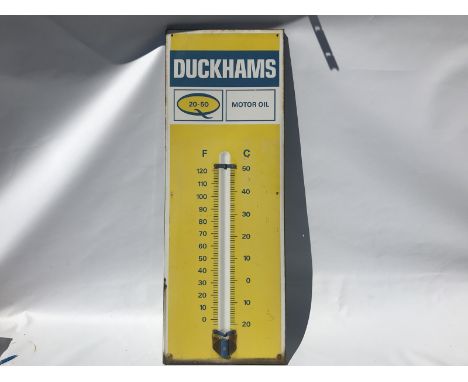 A Duckhams 20-50 Motor Oil enamel thermometer by Burnham, lacking tube, 13 x 36".