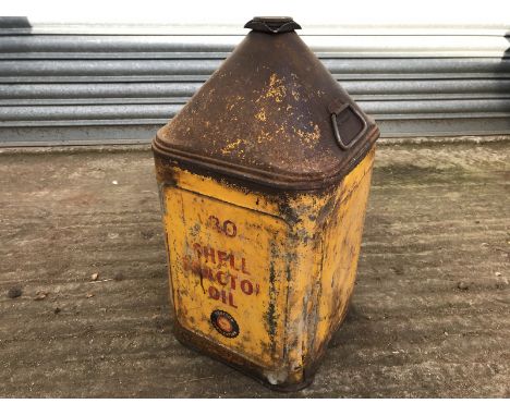 A Shell Tractor Oil five gallon pyramid can.