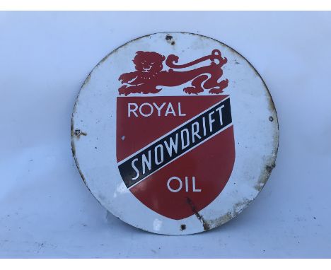 A Royal Snowdrift Oil circular enamel sign for fixing to an oil cabinet, 12" diameter.