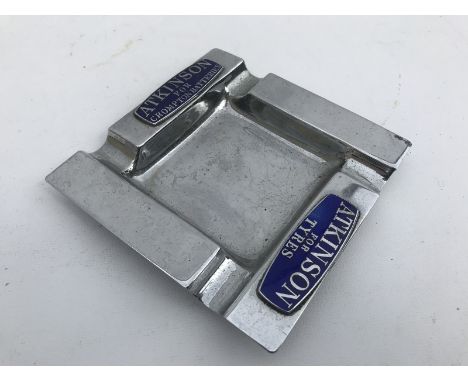 An Atkinson Tyres for Crompton Batteries and for Tyres chrome plated ashtray with two blue enamel plaques. 