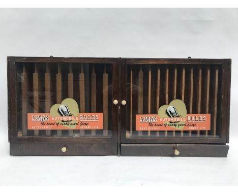 A Lumax Automobile Bulbs two door, wall hanging cabinet with sundry bulb contents.