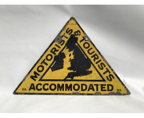 An unusual AA Motorists and Tourists Accomodated triangular enamel sign with some retouching, 17 1/2 x 12 3/4".