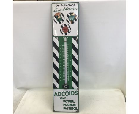 A Duckham's Adcoids Black and White enamel thermometer, in very good condition, 11 x 45 1/4".