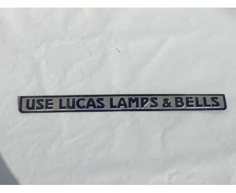 A Lucas Lamps and Bells embossed shelf strip, in good condition.