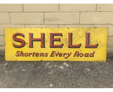 A Shell 'Shortens Every Road' rectangular enamel sign, 54 x 18".