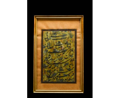 Ca. 18th -19th century AD Persia. A paper calligraphy panel, densely written with thick strokes of black nasta'liq reserved a