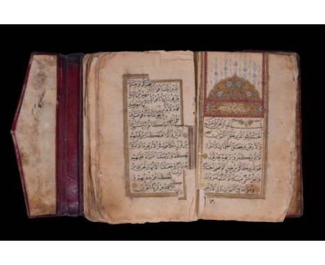 Ca. 1500 AD. An illuminated with decorative carpet pages containing the opening surHijrahs. Carpet pages are decorated in bur