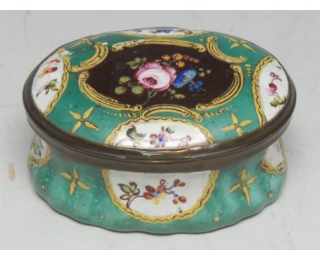 A George III South Staffordshire enamel oval patch box, the hinged cover enclosing a mirror plate, painted in polychrome enam