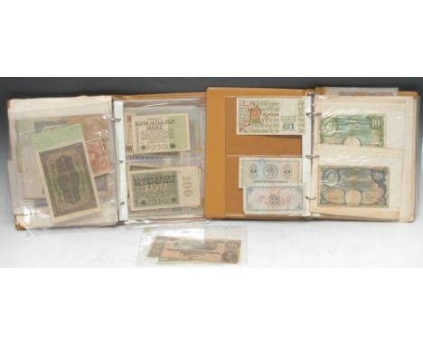 Banknotes, World: a collection of banknotes contained in two Boots ring bound albums, 1 Miscellaneous mainly well circulated 