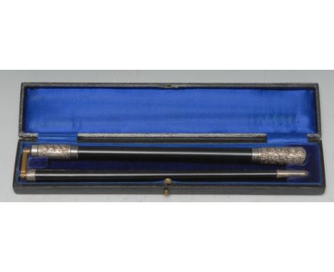 A George V silver mounted ebony folding conductor's baton, hinged and screw-threaded mechanism to centre, the pommel and moun