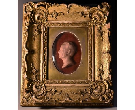 A 19th century wax portrait, of a gentleman, in profile facing to dexter, 7cm x 5cm, inscribed to verso Died april, Thursday 