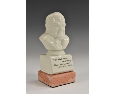 A ceramic desk bust, of Sir Winston Churchill, printed quotation, square base, 14cm high