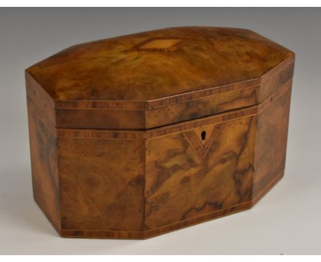 A Victorian rosewood-crossbanded walnut lozenge-shaped tea caddy, hinged domed cover, outlined throughout with boxwood string