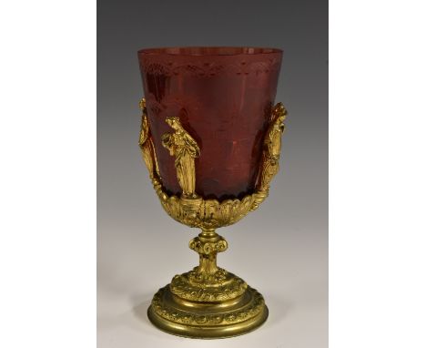 A Bohemian ruby glass and gilt metal goblet, the bucket shaped bowl cut with architectural views, figures and Rococo cartouch