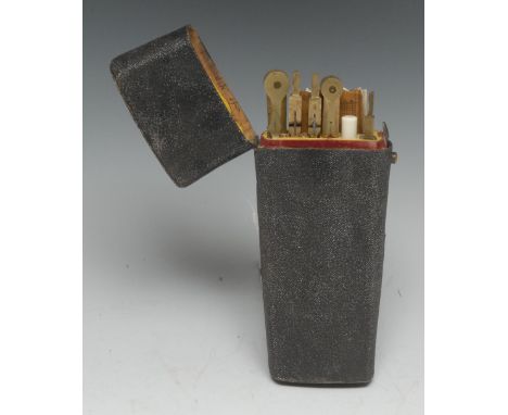 A George III shagreen tapered rounded rectangular draughtsman's etui, hinged cover enclosing an arrangement of drawing instru