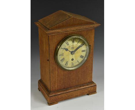 Military Aviation - an early 20th century oak RAF officer's mess mantel clock, 12.5cm circular brass dial inscribed with Arab