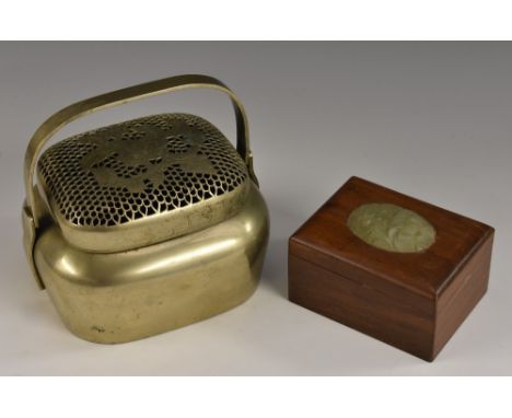 A Chinese jade mounted hardwood box, the cover set with an oval tablet carved with lotus flowers, 9.5cm wide; a Chinese brazi