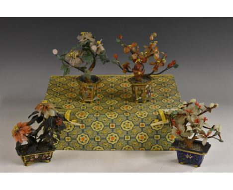 A pair of Chinese hardstone model trees, each with blossoming branches, hexagonal cloisonne enamel jardinieres, 15cm high; ot