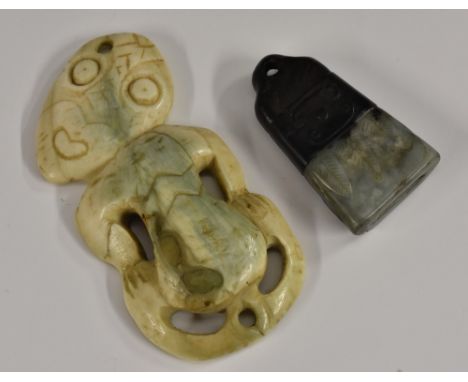 Tribal Art - a Maori two-tone jade amulet, carved with geometric scrolls above a frieze of stiff leafy foliage, pierced suspe