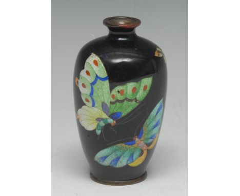 A Japanese cloisonné enamel cabinet vase, of small portions, decorated in brilliantly coloured enamels with butterflies in fl