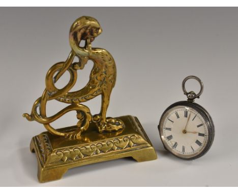 A 19th century brass pocket watch stand, cast as a griffin, spreading base with bracket feet, 11cm high, Swiss silver fob wat