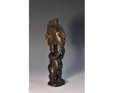 Tribal Art - a Senufo figure, he stands, with ridged coiffure, 18.5cm high, West Africa