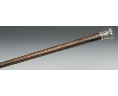A late 19th century silver coloured metal mounted gentleman's walking cane, the domed pommel chased with roses and scrolling 